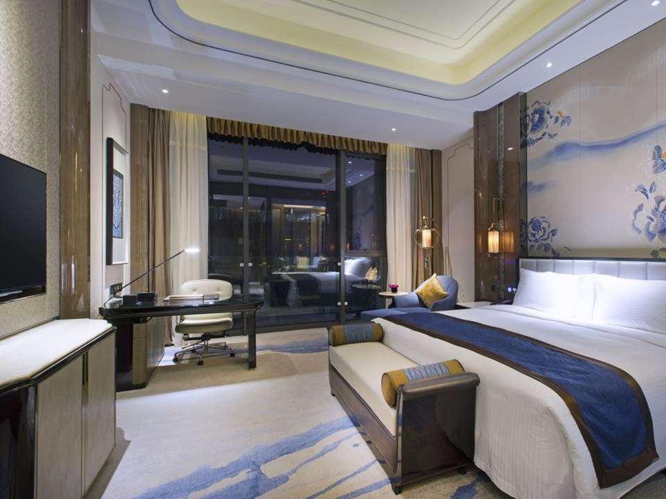 Wanda Vista Kunming Hotell Rum bild